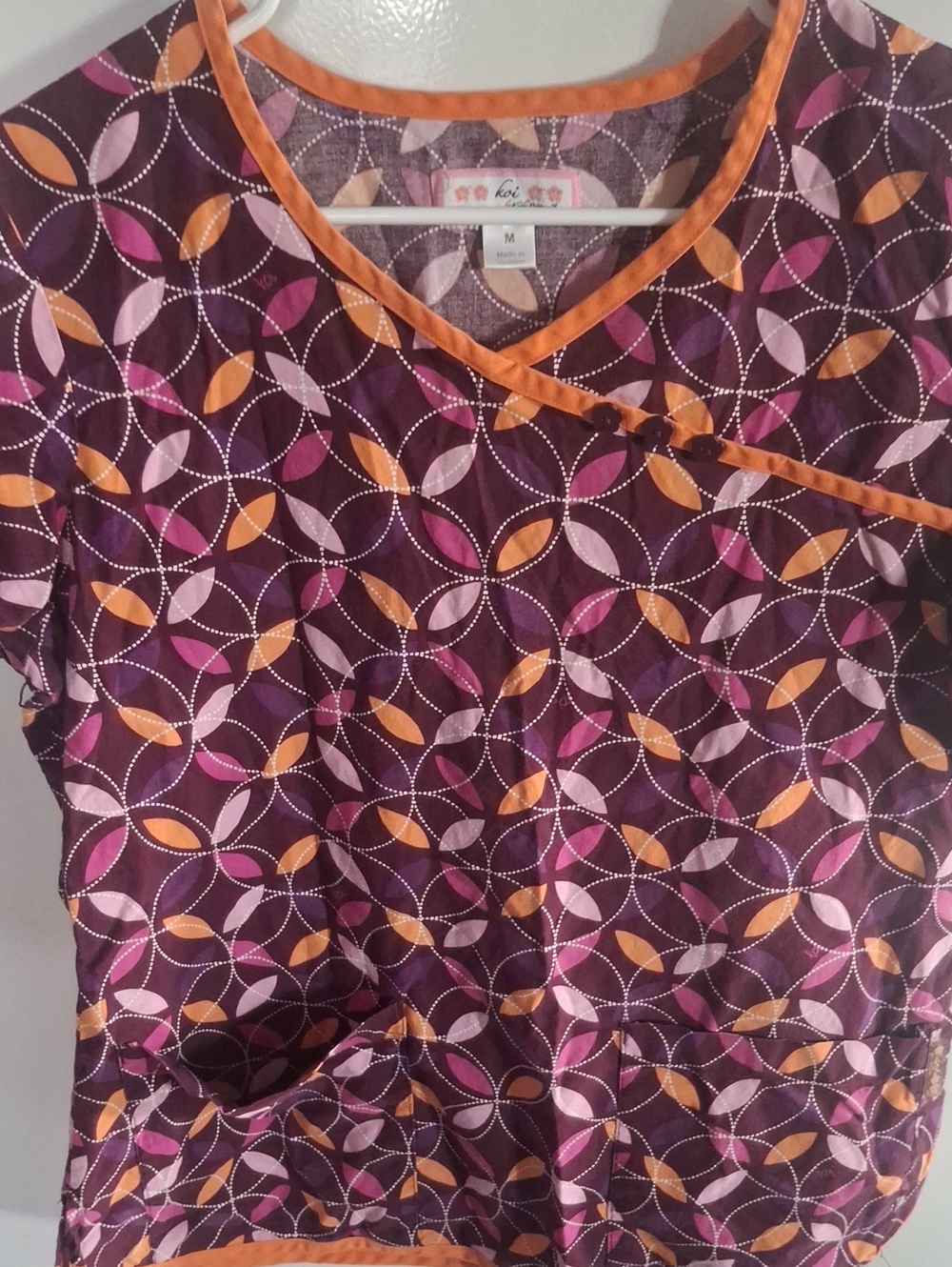 Purple Geometric Scrub Top with Orange Trim